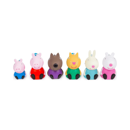 Set of colorful animal figurines on a white background